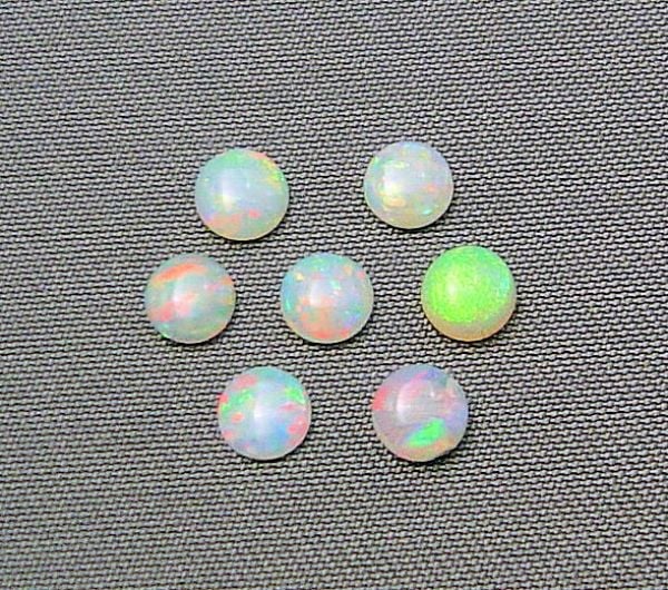 Opal 4mm Round Cabochons @ $60.00/ct.