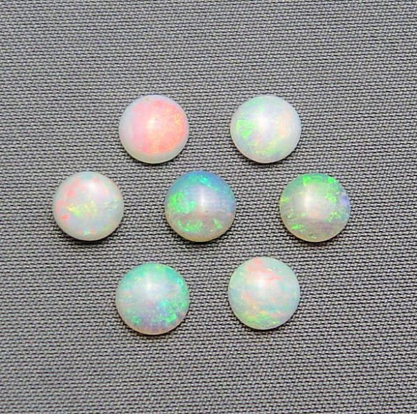 Opal 5.25mm Round Cabochons @ $40.00/ct.
