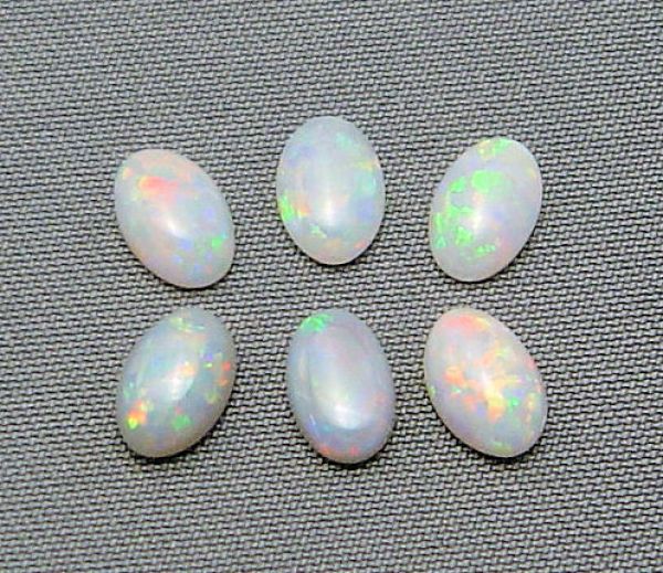 Opal Grey Base Oval Cabochon @ $30.00/ct. - 4x6mm