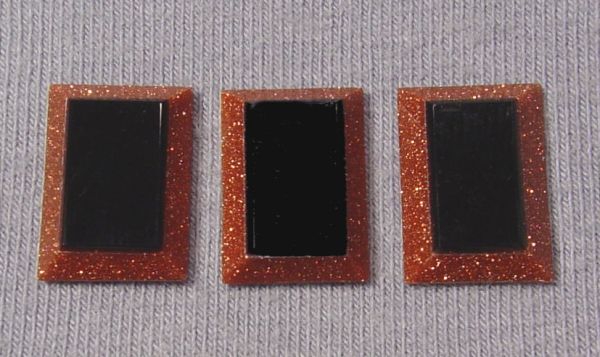 Black Onyx on Goldstone Cushions - 10x14mm
