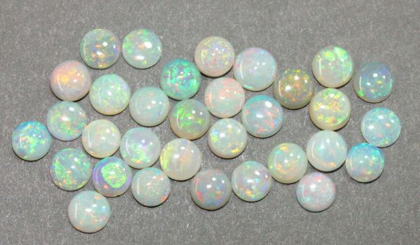 Opal 5mm Round Cabochons @ $60.00/ct.