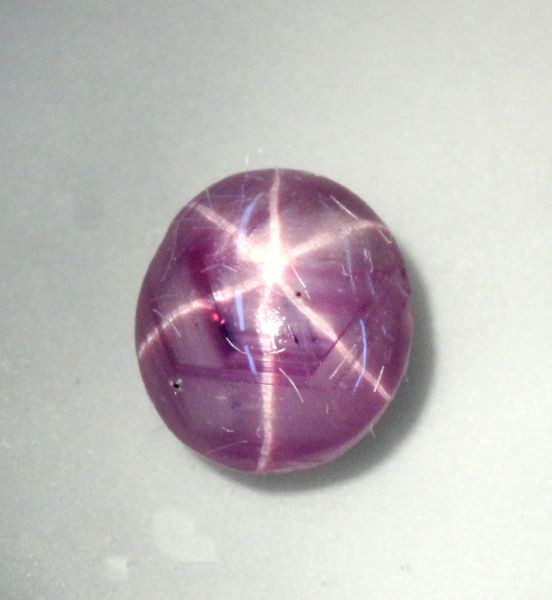 Star Ruby Oval Cabochon - 0.77 ct. 4.8x5.4mm - Good Grade