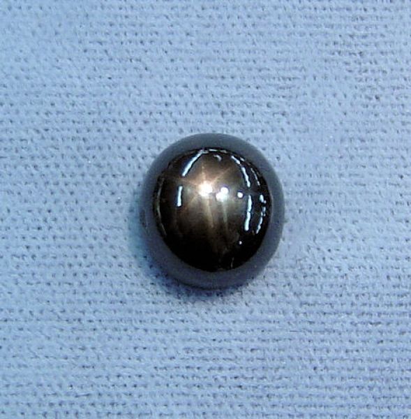 Black Star Sapphire Oval Cabochon  9.8x10.5mm - 6.52 cts.