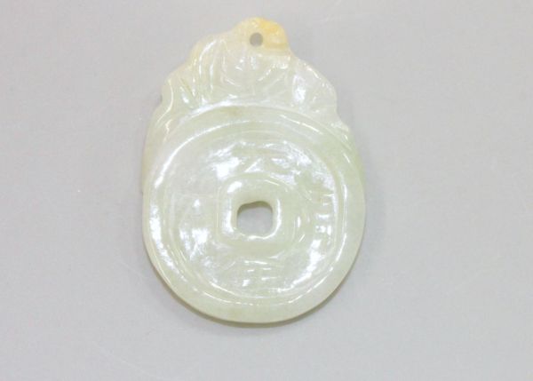Jadeite Tiny Bat on Coin