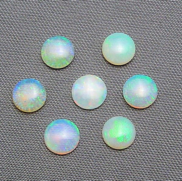 Opal 5.5mm Round Cabocbons @ $30.00/ct.