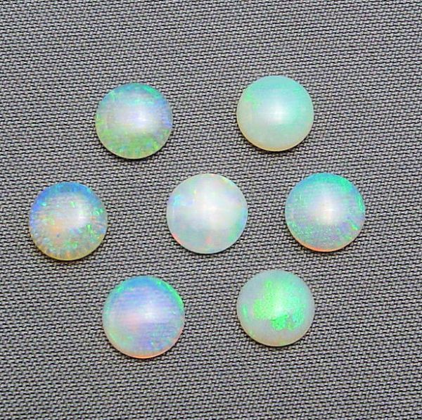 Opal Round Cabocbons, @$30.00/ct. - 5.5mm