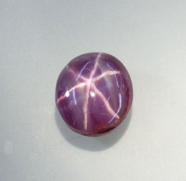 Star Ruby Oval Cabochon, 1.50 cts. 6x6.8mm - Fine Grade