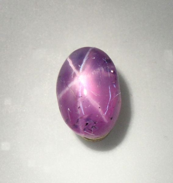 Star Ruby Oval Cabochon,  1.24 cts. 4.4x6.4mm - Good Grade