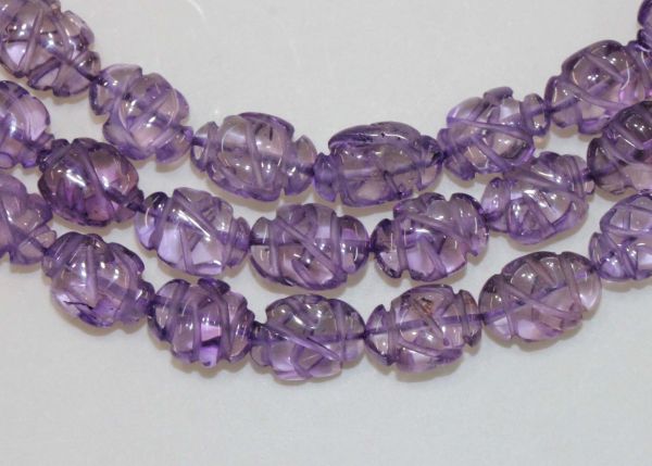 Amethyst Carved Oval Bead Strands