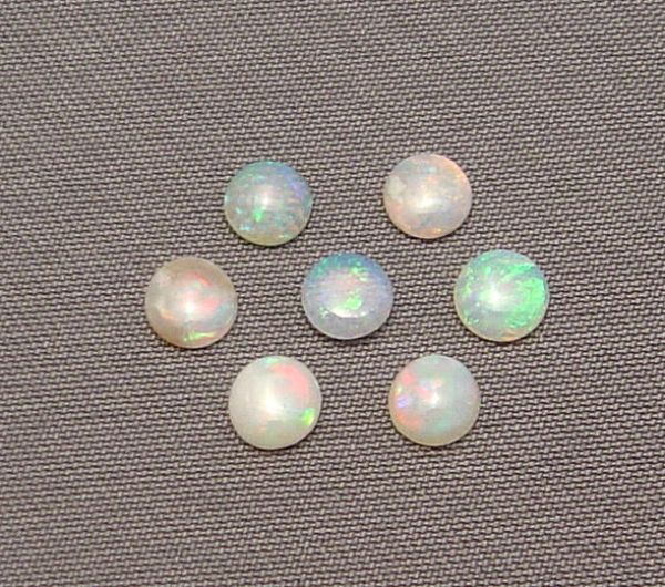 Opal 4mm Round Cabochons @ $30.00/ct.