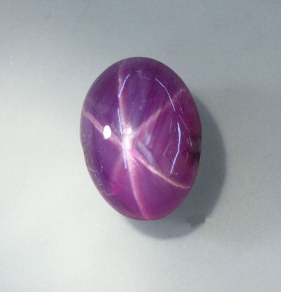 Star Ruby Oval Cabochon, 2.42 cts. 5.9x8.1mm - Fine Grade