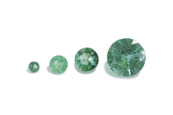 Diamond-cut round natural emeralds