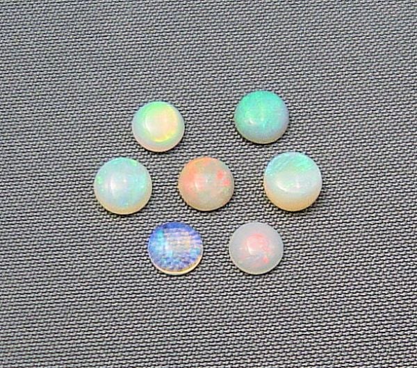 Opal 4mm Round Cabochons @ $40.00/ct.