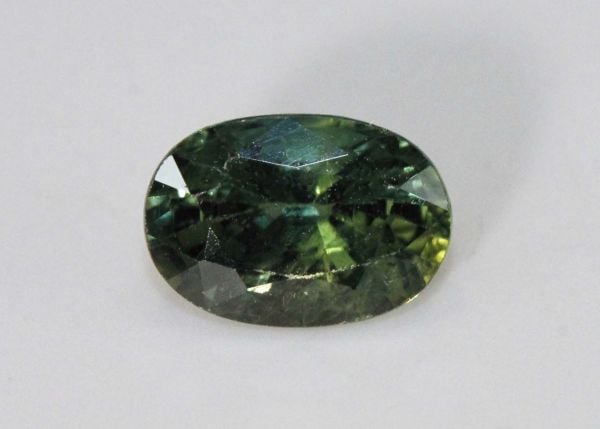 Green Sapphire Faceted Oval, 1.23 cts. - 5.1x7.4mm