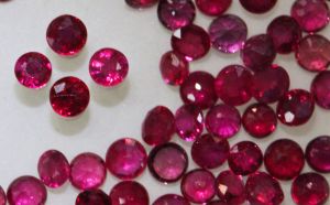 Ruby M 2 Wholesale Ruby Faceted Rounds 2-3mm - $125.00/ct.